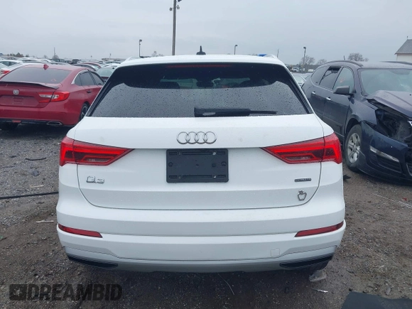 2020 Audi Q3 Premium with VIN WA1AECF35L1030273, listed as a IAAI auction lot 42006553 with 81,944 mi miles. Bid and sale history available at carsss.com. Image 16.