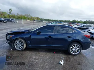 2015 Mazda 3 S Grand Touring z VIN JM1BM1W35F1238188, wystawiony jako IAAI lot #41206030 z przebiegiem 316 542 mil mil oraz . Historia ofert i sprzedaży dostępna na DreamBid. Obrazek 14.