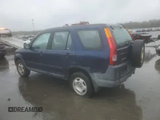 2004 Honda CR-V LX with VIN SHSRD78474U252663, listed as a Copart auction lot 52090185 with 202,703 mi miles and Salvage Title. Bid and sale history available at carsss.com. Image 2.