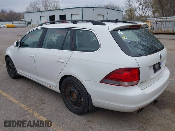 2014 Volkswagen Jetta SportWagen TDI with VIN 3VWML7AJ5EM601267, listed as a IAAI auction lot 42074261 with 155,310 mi miles. Bid and sale history available at carsss.com. Image 3.