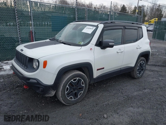 2015 Jeep Renegade Trailhawk with VIN ZACCJBCT5FPB91056, listed as a IAAI auction lot 41609659 with 145,109 mi miles and . Bid and sale history available at DreamBid. Image 2.