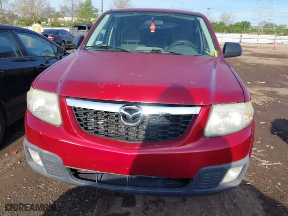 2008 Mazda Tribute Touring with VIN 4F2CZ02Z28KM25492, listed as a IAAI auction lot 42100730 with 231,093 mi miles. Bid and sale history available at carsss.com. Image 6.