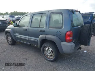 2002 Jeep Liberty Sport with VIN 1J4GL48K32W324864, listed as a IAAI auction lot 41962179 with 147,988 mi miles. Bid and sale history available at carsss.com. Image 3.