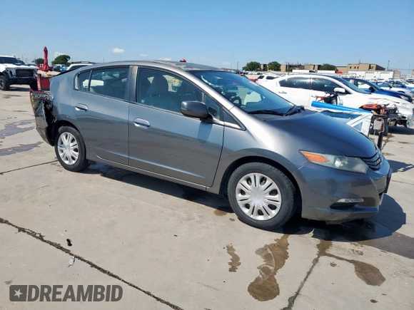 2010 Honda Insight LX with VIN JHMZE2H56AS042097, listed as a Copart auction lot 53972215 with 107,182 mi miles and Salvage Title. Bid and sale history available at DreamBid. Image 4.