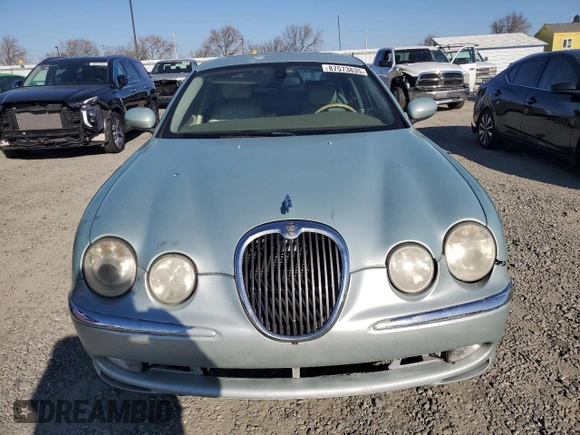2003 Jaguar S-Type with VIN SAJEA01T93FM46260, listed as a Copart auction lot 87573835 with 129,563 mi miles and Clean Title. Bid and sale history available at DreamBid. Image 5.