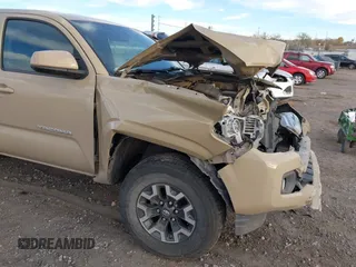 2016 Toyota Tacoma SR with VIN 5TFRX5GN8GX057937, listed as a IAAI auction lot 40760420 with 113,698 mi miles and . Bid and sale history available at DreamBid. Image 18.