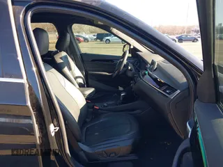 2018 BMW X1 xDrive28i with VIN WBXHT3C36J5F91110, listed as a IAAI auction lot 41757293 with 80,327 mi miles. Bid and sale history available at carsss.com. Image 5.