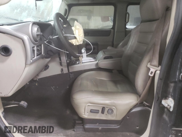 2003 Hummer H2 with VIN 5GRGN23U33H143023, listed as a Copart auction lot 84403414 with 0 mi miles and Salvage Title. Bid and sale history available at carsss.com. Image 7.