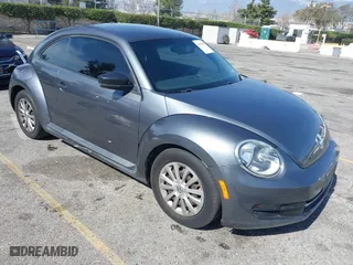 2012 Volkswagen Beetle Entry PZEV with VIN 3VWFP7ATXCM645079, listed as a IAAI auction lot 41593451 with 133,377 mi miles. Bid and sale history available at carsss.com. Image 1.