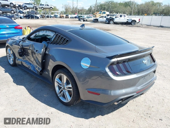 2021 Ford Mustang EcoBoost with VIN 1FA6P8TH5M5108957, listed as a IAAI auction lot 41678800 with 31,219 mi miles. Bid and sale history available at carsss.com. Image 3.
