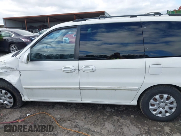 2005 Kia Sedona LX with VIN KNDUP132356708456, listed as a IAAI auction lot 41220936 with 172,960 mi miles. Bid and sale history available at carsss.com. Image 14.