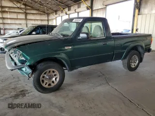 2001 Mazda B-Series Truck DS z VIN 4F4YR12U31TM11995, wystawiony jako Copart lot #74604534 z przebiegiem 140 015 mil mil oraz Czysty tytuł • Clean title. Historia ofert i sprzedaży dostępna na DreamBid. Obrazek 1.