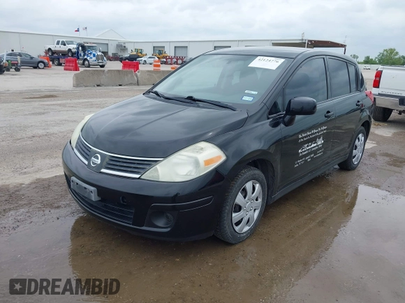 2009 Nissan Versa 1.8 SL with VIN 3N1BC13E79L393141, listed as a IAAI auction lot 42124776 with 233,137 mi miles. Bid and sale history available at carsss.com. Image 2.