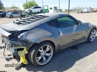 2012 Nissan 370Z z VIN JN1AZ4EH6CM561397, wystawiony jako IAAI lot #41812673 z przebiegiem 53 861 mil mil oraz . Historia ofert i sprzedaży dostępna na DreamBid. Obrazek 4.