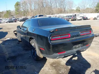 2020 Dodge Challenger SXT with VIN 2C3CDZAG1LH240339, listed as a IAAI auction lot 41613082 with 69,450 mi miles and . Bid and sale history available at DreamBid. Image 3.