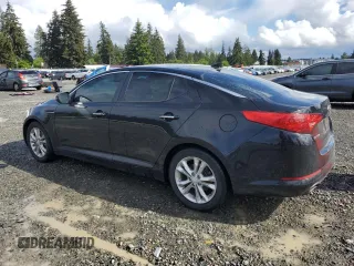 2013 Kia Optima EX z VIN 5XXGN4A78DG227184, wystawiony jako Copart lot #57710015 z przebiegiem 154 906 mil mil oraz Czysty tytuł • Clean title. Historia ofert i sprzedaży dostępna na DreamBid. Obrazek 2.