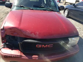 2001 GMC Sonoma SLS 1SG z VIN 1GTCS19W918225024, wystawiony jako Copart lot #49043895 z przebiegiem 140 616 mil mil oraz Szkody całkowita. Historia ofert i sprzedaży dostępna na DreamBid. Obrazek 11.