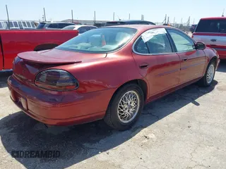 2000 Pontiac Grand Prix SE with VIN 1G2WJ52K3YF262773, listed as a IAAI auction lot 42031719 with 164,284 mi miles. Bid and sale history available at carsss.com. Image 4.