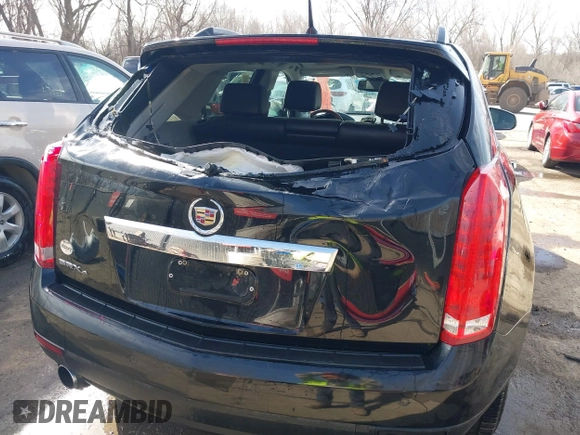 2011 Cadillac SRX Luxury Collection z VIN 3GYFNDEY9BS611653, wystawiony jako IAAI lot #41811912 z przebiegiem 144 689 mil mil oraz . Historia ofert i sprzedaży dostępna na DreamBid. Obrazek 6.