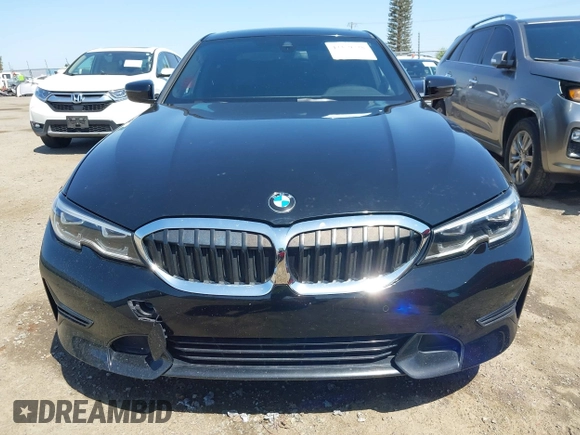 2019 BMW 3 Series 330i with VIN WBA5R1C50KAJ98579, listed as a IAAI auction lot 42359728 with 41,173 mi miles and . Bid and sale history available at DreamBid. Image 12.