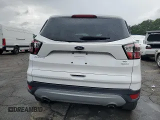 2017 Ford Escape SE z VIN 1FMCU0GD7HUC33240, wystawiony jako Copart lot #59627995 z przebiegiem 105 670 mil mil oraz Czysty tytuł • Clean title. Historia ofert i sprzedaży dostępna na DreamBid. Obrazek 6.