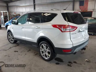 2016 Ford Escape Titanium with VIN 1FMCU9J90GUA18743, listed as a IAAI auction lot 42419730 with 102,666 mi miles and . Bid and sale history available at DreamBid. Image 3.