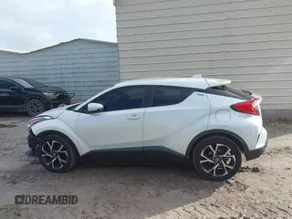 2018 Toyota C-HR XLE with VIN JTNKHMBX3J1010211, listed as a IAAI auction lot 40799443 with 104,148 mi miles. Bid and sale history available at carsss.com. Image 15.