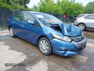 2010 Honda Insight LX z VIN JHMZE2H5XAS042328, wystawiony jako IAAI lot #42420927 z przebiegiem 179 222 mil mil oraz . Historia ofert i sprzedaży dostępna na DreamBid. Obrazek 1.