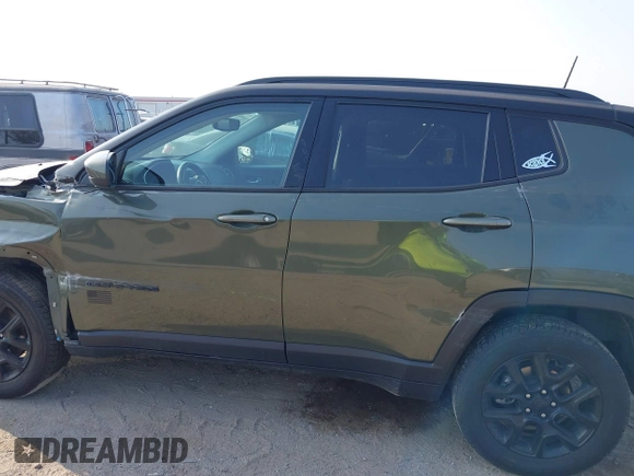 2021 Jeep Compass Sport with VIN 3C4NJDAB2MT591225, listed as a IAAI auction lot 40304781 with 63,948 mi miles and . Bid and sale history available at DreamBid. Image 14.