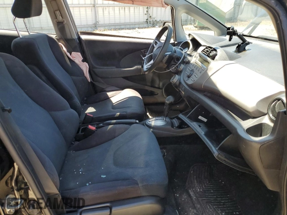 2011 Honda Fit Sport with VIN JHMGE8H57BC024827, listed as a Copart auction lot 59704194 with 146,316 mi miles and Salvage Title. Bid and sale history available at DreamBid. Image 7.