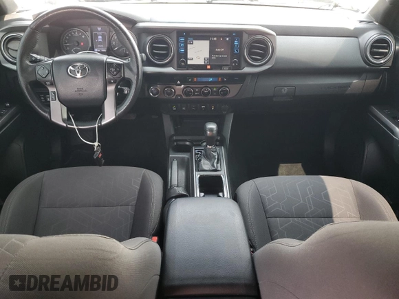 2017 Toyota Tacoma SR5 with VIN 3TMCZ5AN7HM105170, listed as a Copart auction lot 57628685 with 52,654 mi miles and Salvage title. Bid and sale history available at DreamBid. Image 8.