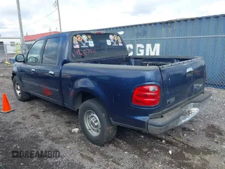2002 Ford F-150 XLT with VIN 1FTRW07L62KD79180, listed as a IAAI auction lot 42007511 with 359,139 mi miles. Bid and sale history available at carsss.com. Image 3.