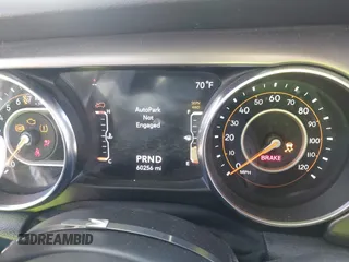 2020 Jeep Wrangler Unlimited Sport S with VIN 1C4HJXDG1LW237405, listed as a IAAI auction lot 40631451 with 60,256 mi miles and . Bid and sale history available at DreamBid. Image 7.