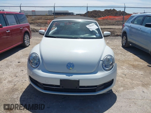 2015 Volkswagen Beetle 1.8T w/Tech with VIN 3VW517AT9FM810122, listed as a IAAI auction lot 41815980 with 72,420 mi miles and . Bid and sale history available at DreamBid. Image 12.