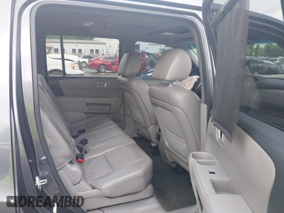 2015 Honda Pilot SE z VIN 5FNYF3H35FB034592, wystawiony jako IAAI lot #42133579 z przebiegiem 108 980 mil mil oraz . Historia ofert i sprzedaży dostępna na DreamBid. Obrazek 8.