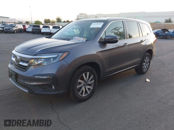 2021 Honda Pilot EX-L with VIN 5FNYF5H54MB018846, listed as a IAAI auction lot 41208987 with 80,757 mi miles and . Bid and sale history available at DreamBid. Image 2.