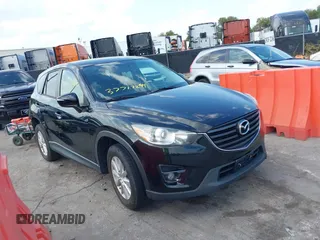 2016 Mazda CX-5 Touring with VIN JM3KE2CY5G0653108, listed as a IAAI auction lot 37717249 with 90,704 mi miles and . Bid and sale history available at carsss.com. Image 1.