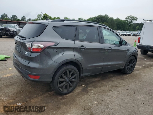2017 Ford Escape SE z VIN 1FMCU9GD1HUB35003, wystawiony jako Copart lot #56502385 z przebiegiem 74 409 mil mil oraz Szkoda całkowita • Salvage title. Historia ofert i sprzedaży dostępna na DreamBid. Obrazek 3.