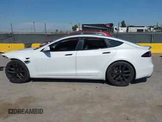 2023 Tesla Model S with VIN 5YJSA1E59PF500816, listed as a IAAI auction lot 42409049 with Not provided miles and . Bid and sale history available at DreamBid. Image 14.