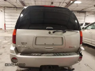 2005 GMC Envoy SLE with VIN 1GKET16S656102522, listed as a IAAI auction lot 41729310 with 233,049 mi miles. Bid and sale history available at carsss.com. Image 17.