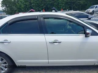 2012 Lincoln MKZ with VIN 3LNHL2GC8CR808103, listed as a IAAI auction lot 42506096 with 129,690 mi miles and . Bid and sale history available at DreamBid. Image 13.