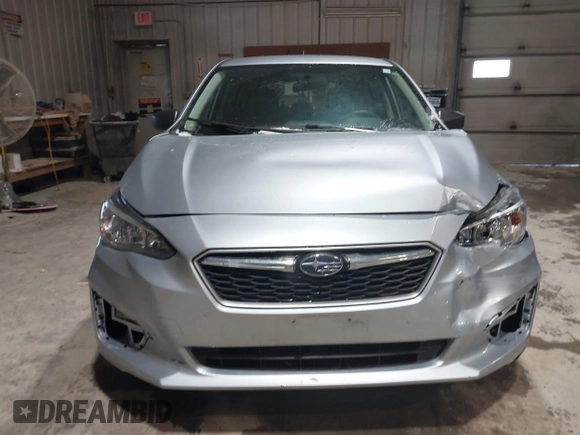 2019 Subaru Impreza z VIN 4S3GTAA6XK3751073, wystawiony jako IAAI lot #41727552 z przebiegiem 131 982 mil mil oraz . Historia ofert i sprzedaży dostępna na DreamBid. Obrazek 12.