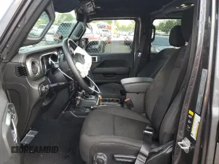 2022 Jeep Wrangler Unlimited Sahara with VIN 1C4HJXENXNW244773, listed as a Copart auction lot 59694095 with 21,871 mi miles and Salvage title. Bid and sale history available at DreamBid. Image 7.