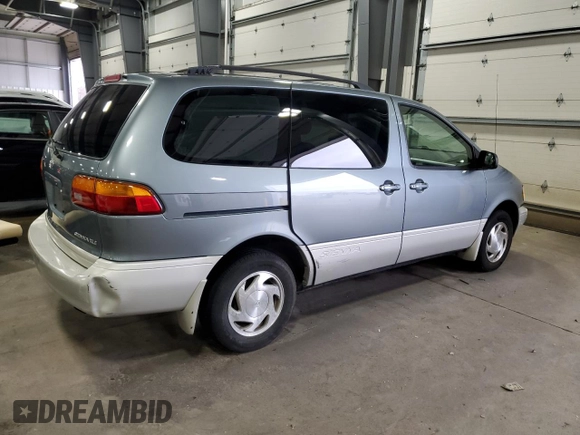 2000 Toyota Sienna LE z VIN 4T3ZF13C7YU284445, wystawiony jako Copart lot #52452465 z przebiegiem 150 609 mil mil oraz Szkoda całkowita • Salvage title. Historia ofert i sprzedaży dostępna na DreamBid. Obrazek 3.