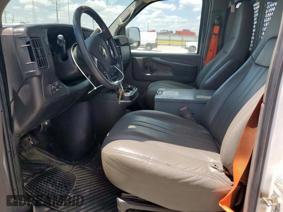 2015 Chevrolet Express Cargo with VIN 1GCWGFCF5F1248790, listed as a Copart auction lot 61902515 with 128,794 mi miles and Clean title. Bid and sale history available at DreamBid. Image 7.