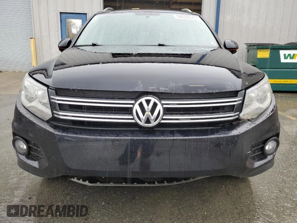 2013 Volkswagen Tiguan SE z VIN WVGBV7AX3DW544490, wystawiony jako Copart lot #52632675 z przebiegiem 149 170 mil mil oraz Czysty tytuł • Clean title. Historia ofert i sprzedaży dostępna na DreamBid. Obrazek 5.