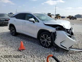 2021 Lexus RX with VIN 2T2HZMAA6MC218006, listed as a Copart auction lot 43633265 with 79,704 mi miles and Salvage Title. Bid and sale history available at carsss.com. Image 4.