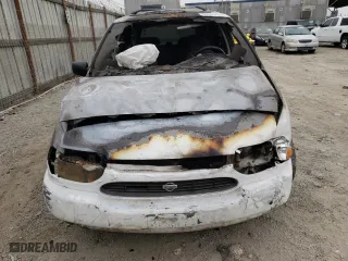 1999 Nissan Quest GXE with VIN 4N2XN11T1XD805536, listed as a Copart auction lot 69680414 with 194,685 mi miles and Salvage Title. Bid and sale history available at carsss.com. Image 5.