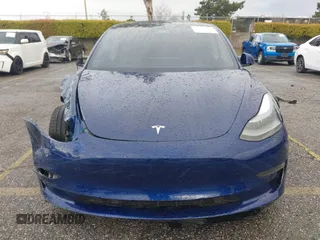 2023 Tesla Model 3 with VIN 5YJ3E1EA0PF518983, listed as a IAAI auction lot 41749225 with 26,748 mi miles and . Bid and sale history available at DreamBid. Image 13.
