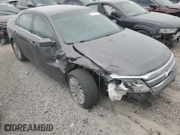 2011 Ford Fusion Hybrid с VIN 3FADP0L39BR214920, выставлен на аукционе Copart как лот 57888465 с пробегом 133 656 миль миль и Списание • Salvage title. История ставок и продаж доступна на DreamBid. Изображение 4.